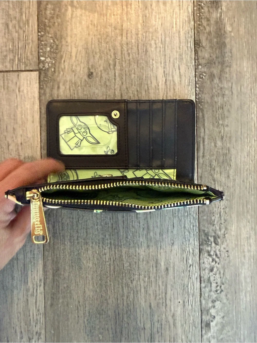 Cute and collectible Loungefly Star Wars Baby Yoda (Grogu) wallet.
